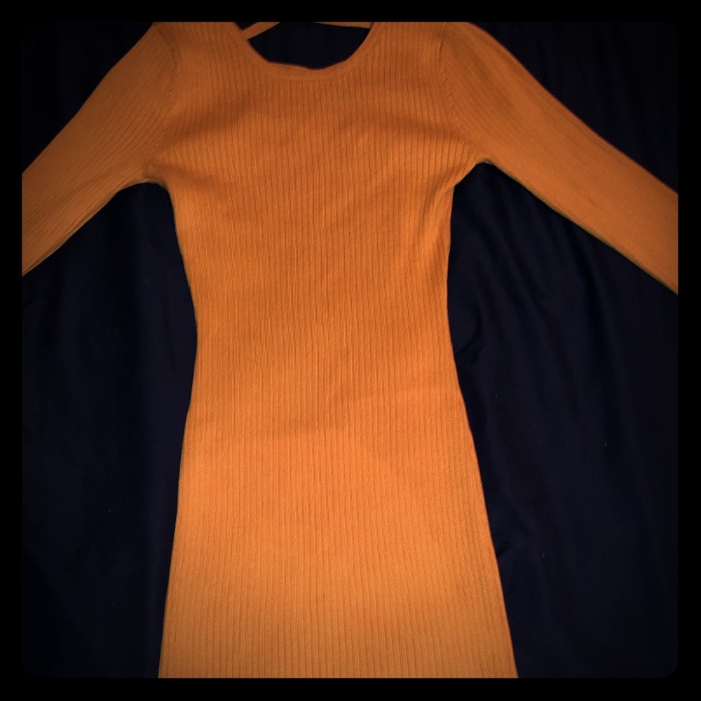 Yellow dress, comes down to the knees